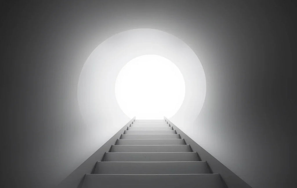 Curved staircase tunnel with arches