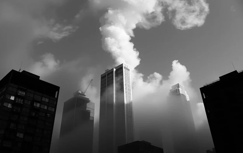 Tower emerging from clouds