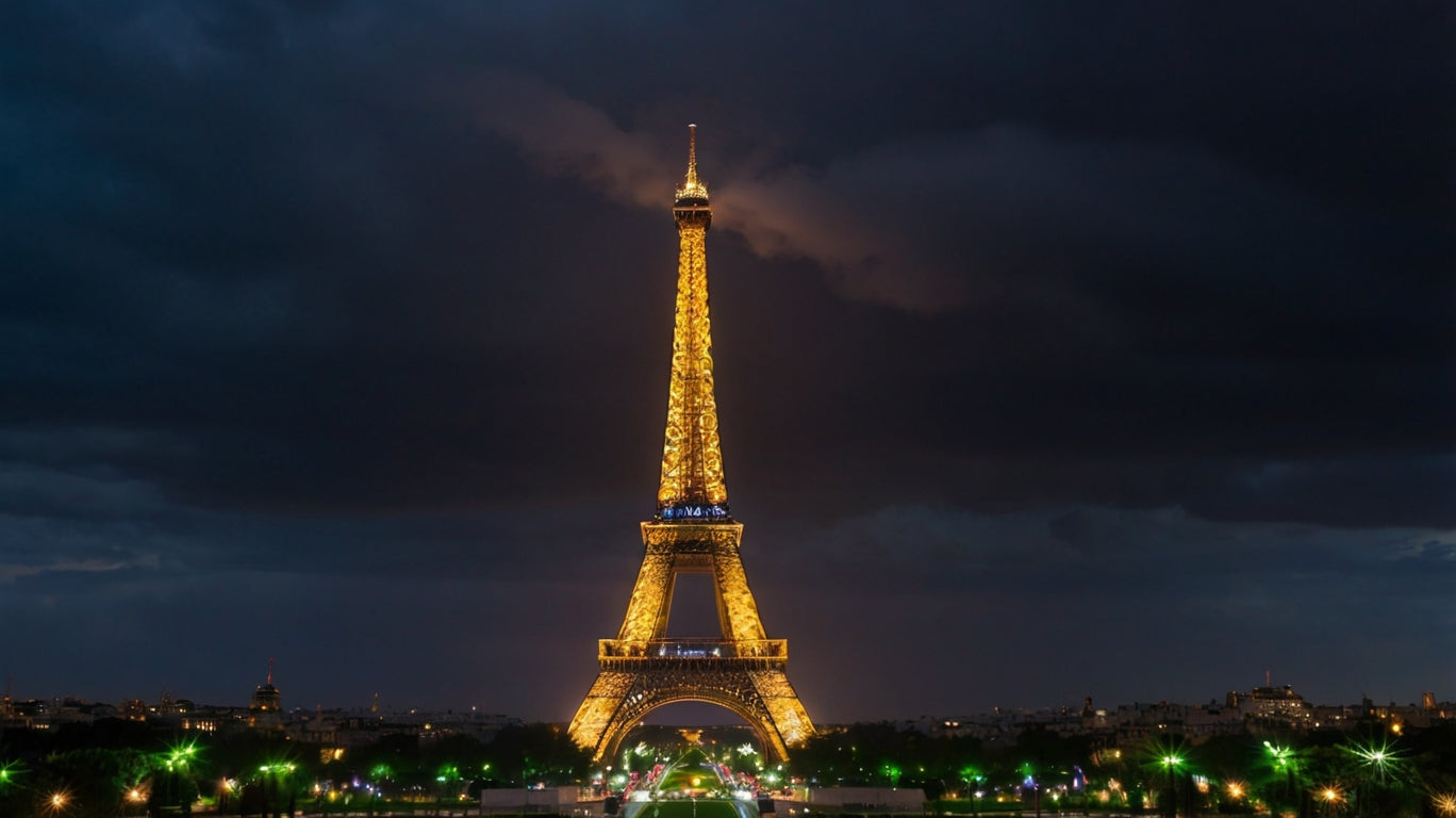 Eiffel Tower at night with stormy clouds