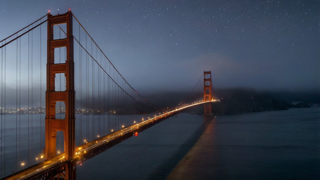 Golden Gate Bridge at night with stars and light trails