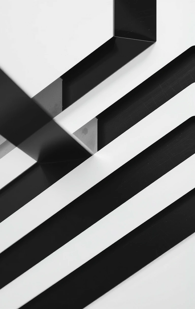 The abstract intersecting black metal beams with strong contrast and depth
