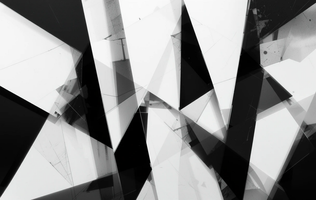The jagged, overlapping triangular shards with dramatic reflections