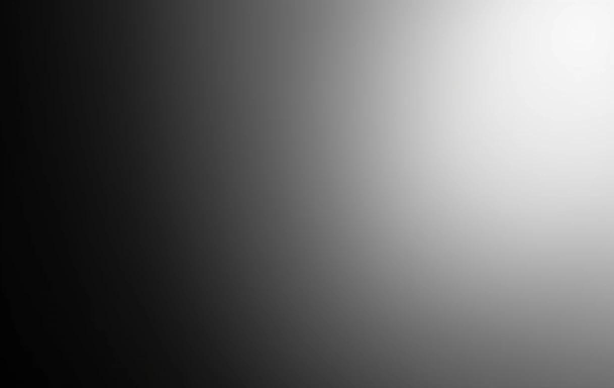 The soft fade from white to deep black with subtle texture