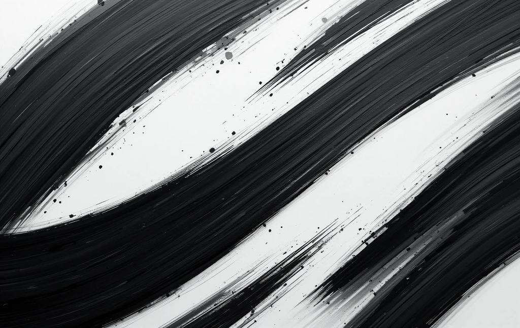 The dynamic black paint brush strokes