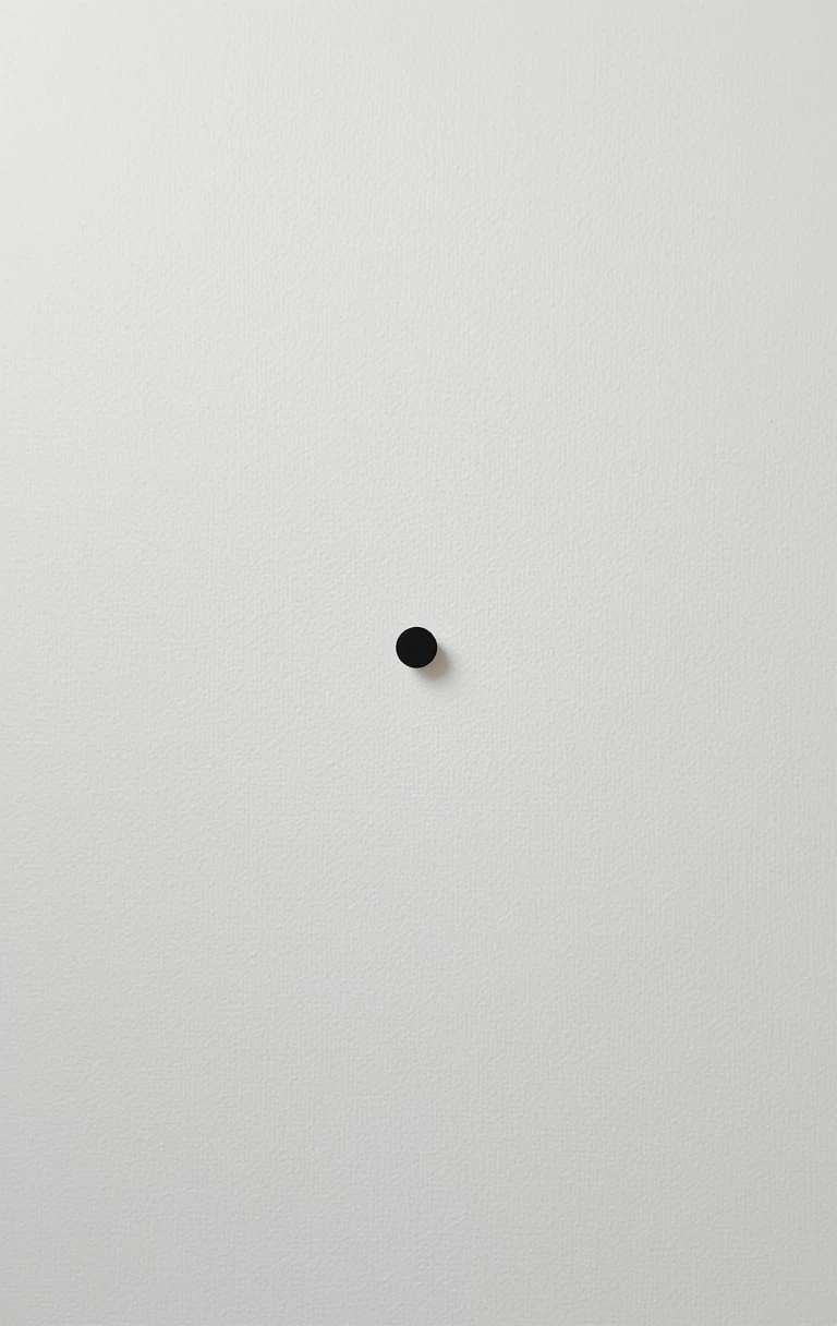 Small black circular splatter with dripGenesis Drop