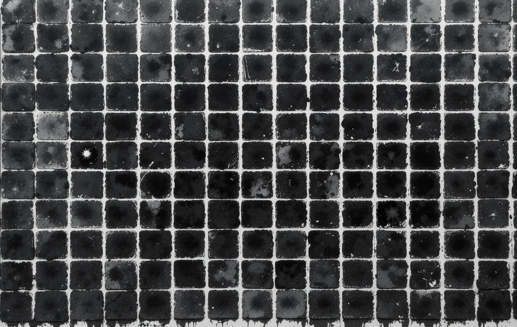 The grid of worn, scratched squares