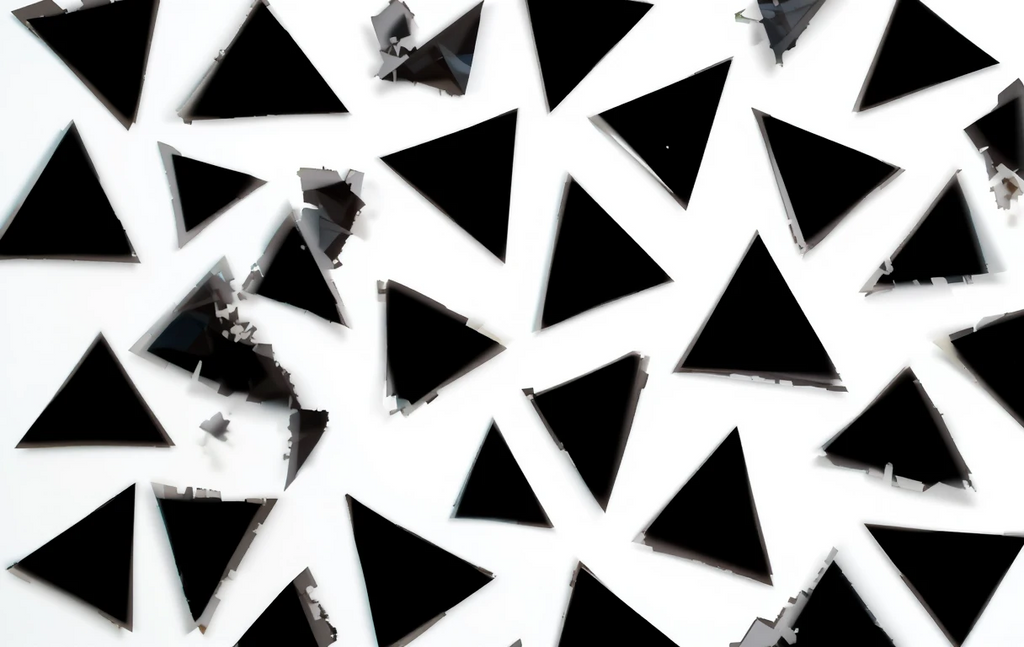 The scattered black triangular shards