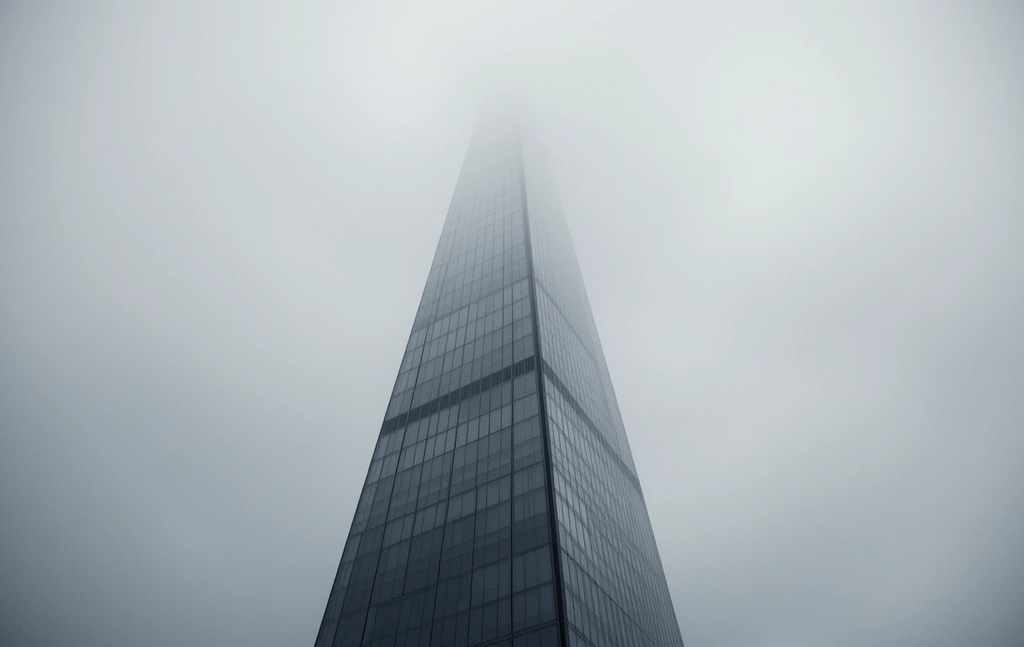 Brutalist concrete buildings in fog